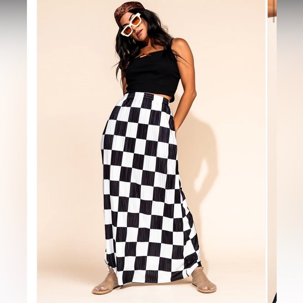Dressed in Lala Santorini midi skirt in black and white checkered